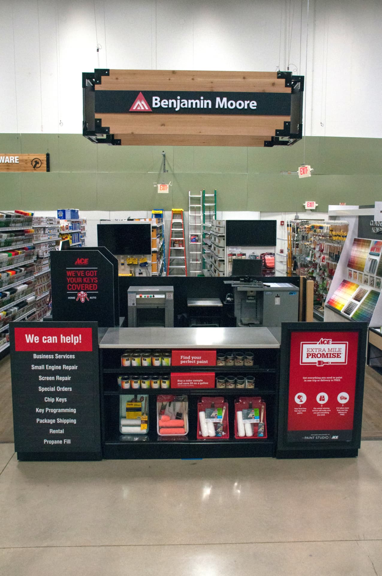 Benjamin Moore paint display and color sample wall in the Milton Ace paint department