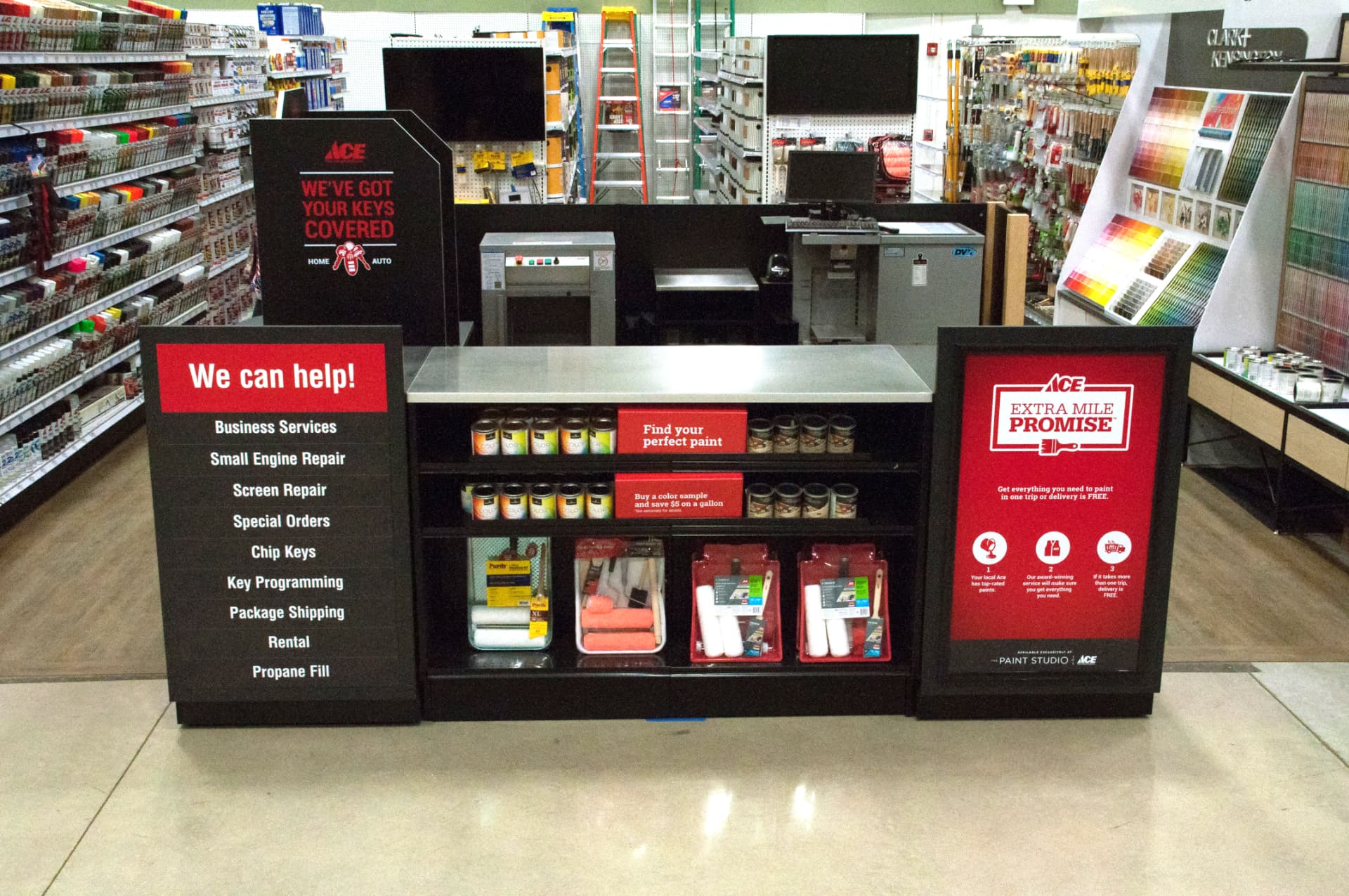 Paint cans and tinting equipment at the Milton Ace Hardware paint counter